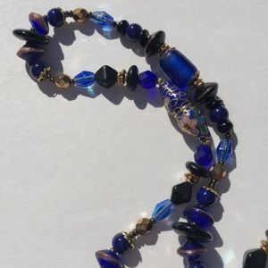 Multi colored necklace with matching earrings.